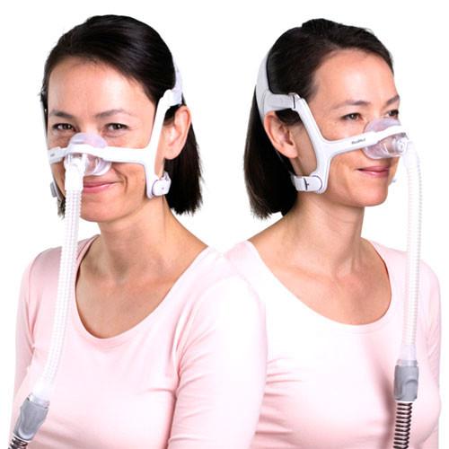 Woman wearing ResMed AirFit N20 nasal CPAP mask for sleep apnea therapy comfort